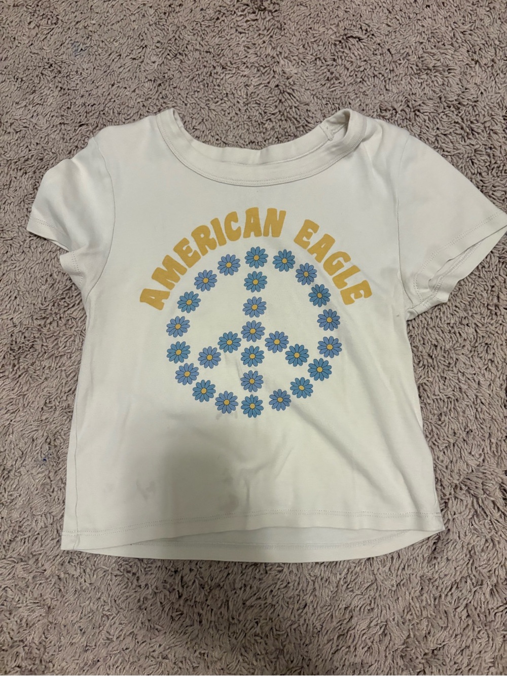 American Eagle Outfitters Kids White Graphic Tee with Blue Floral Peace Sign